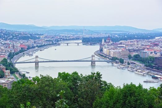 Aerial view of Budapest from Gellert hill, Danube river and Parliament building.