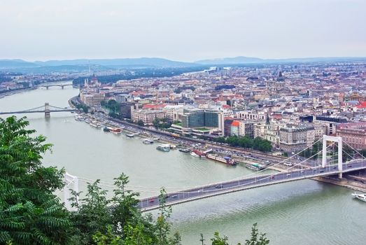 Aerial view of Budapest from Gellert hill, Danube river and Parliament building.