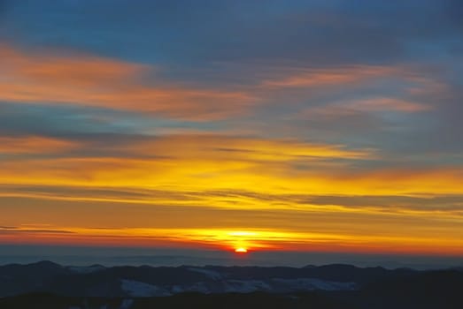 Sunrise over the mountains in Romania.