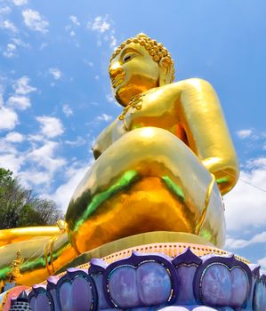 Beautiful Golden Buddha statue, at public temple, Wat Phabuddha navarantur - Golden Triangle in Chiang Rai,Thailand.