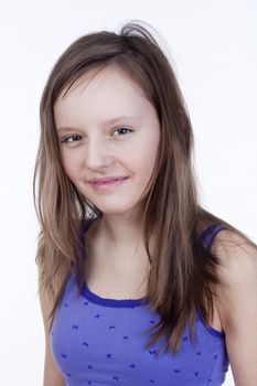 studio portrait of a pretty, eleven years old girl