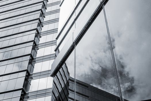 Office glass windows with beautiful reflection in Hong Kong, Asia.