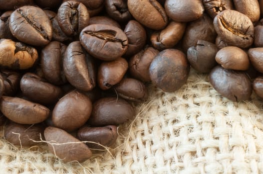 beautiful macro background of coffee with jute