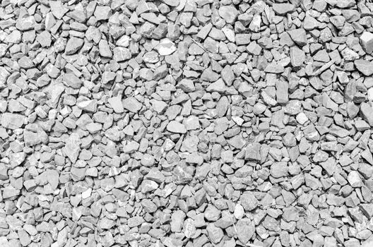 pebble black white stones background. closeup of stones texture, monotone