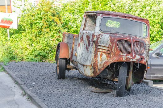 Wülfrath, Nrw, GERMANY - JUNE 06, 2014: For advertising purposes Age truck parked on the street, vintage trucks, platform trucks, tricycle vintage cars from the 50's.