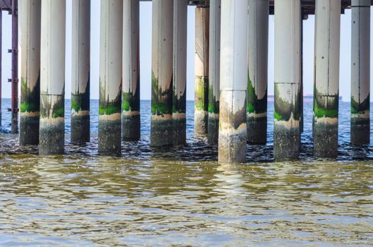 Concrete columns, pillars of the old pier in Scheveningen, Netherlands.