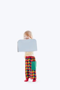 boy with long blond hair and suitcase isolated on white