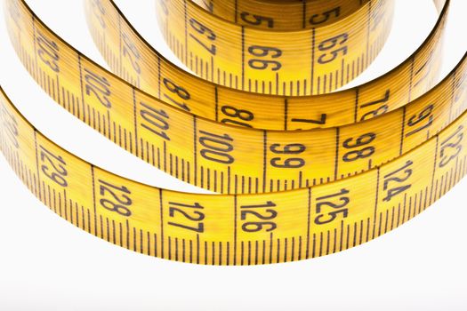 diet - yellow measuring tape isolated on white background