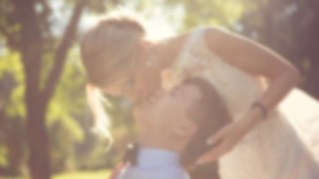 Beautiful wedding couple is enjoying wedding in the sun. 