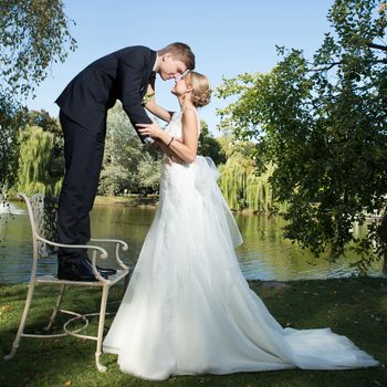 Beautiful wedding couple is enjoying wedding in the sun. 