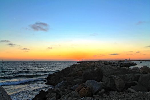 Sunset on the beach at Redondo beach pier.