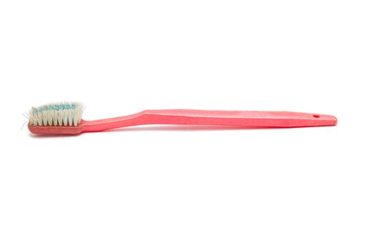 old toothbrush isolated on white background