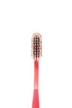 old toothbrush isolated on white background