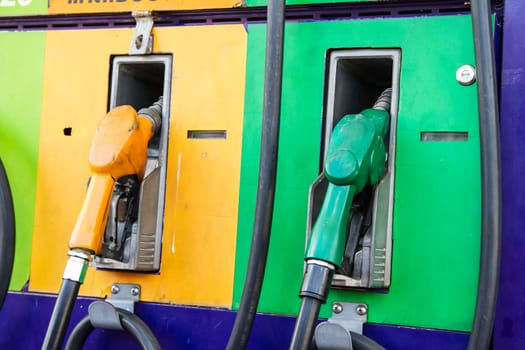 fuel nozzle, gas pump, in service station