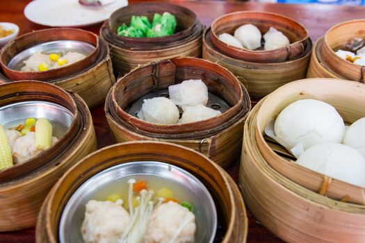 yumcha, dim sum in bamboo steamer, chinese cuisine