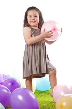 Little girl with balloon isolated on white