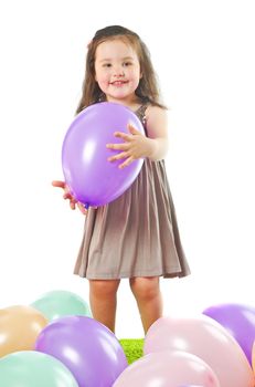 smiling little girl with balloon isolated on white