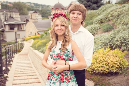 Beautiful wedding couple is enjoying wedding in the sun. 