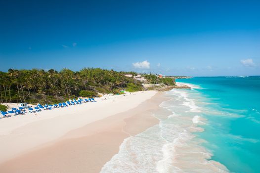 Crane Beach is one of the most beautiful beaches on the Caribbean island of Barbados. It is a tropical paradise with palms hanging over turquoise sea
