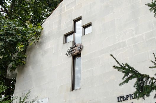 Cross of church on wall Bulgarian advent church