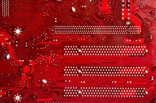 Closeup of a red printed circuit board