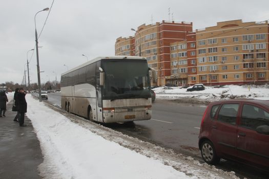 Moscow, Russia - March 4, 2012. Electoral fraud in Russia. A bus with people from the authorities, who vote at multiple polling stations simultaneously