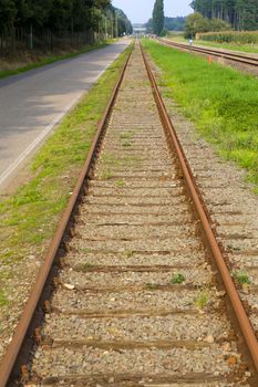 Straight railway line going towards the horizon