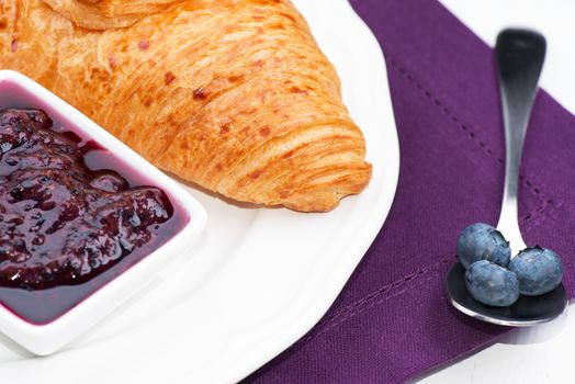 Croissant with jam and blueberry