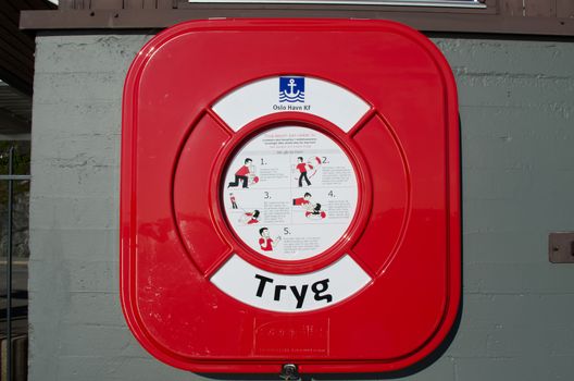 OSLO - AUGUST 11: Modern life buoy system at Oslo fjord sea port on August 11, 2012. An ordinary day 50 to 70 ships sail in and out of the port with passengers and cargo.