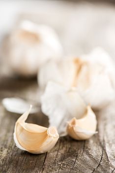 Garlic on rustic wooden table
