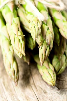 Asparagus on wooden table