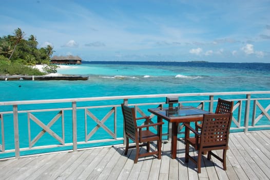 Open air cafe at ocean beach, Bandos Island, Maldives
