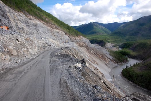 Gravel road Kolyma to Magadan highway at Yakutia, Russia