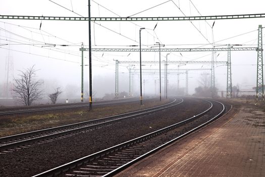 Railroad tracks in the fog