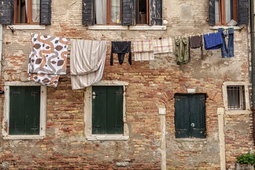 Windows of old house in Venice Italy