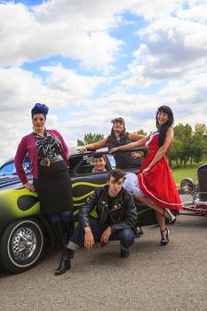 THORNCLIFF CALGARY CANADA, SEPT 13 2014: The annual Show and Shine with Pin Up Girls "Cars before 1964"