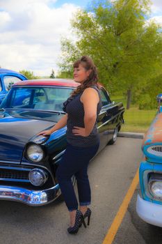 THORNCLIFF CALGARY CANADA, SEPT 13 2014: The annual Show and Shine with Pin Up Girls "Cars before 1964"