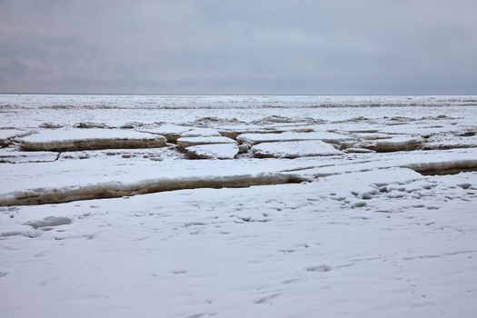 Frozen sea in cold winter weather