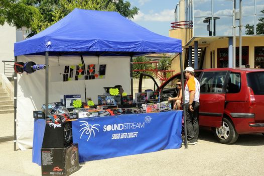 Car tuning exhibition in Saint-Christole-les-Ales in the French department of Gard. stall selling car stereo.