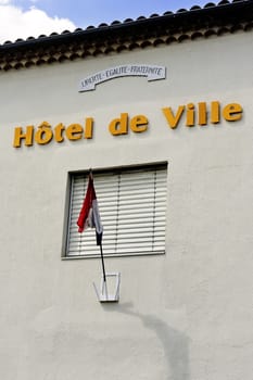 French town hall facade with the motto liberty, equality, fraternity