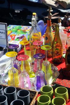 Flea Anduze every Sunday morning throughout the year where tourists and locals meet to buy or sell. Here glass colors.