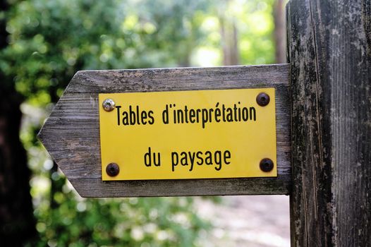 arrow indicating the direction to go to the guidance or interpretation of the landscape in the mountains of the Cevennes table.