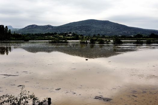 French landscape Cevennes flooded after heavy rains in some of St. Hyppolite-du-Fort on the edge of road.