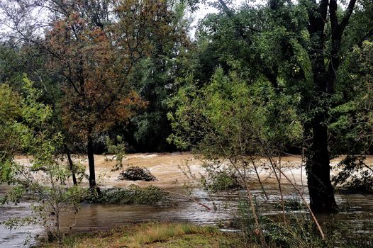 The Vidourle river in flood after heavy rains in France located in the Gard department in the foothills of the Cevennes.