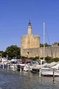 The marina of Aigues-Mortes in the background with the city walls.