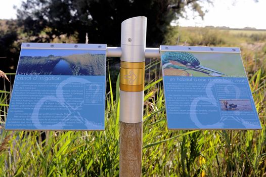 Signaling on the way Vaccar�s Camargue explaining the hikers iriguation systems and Roubine a freshwater habitat with alot of birds.