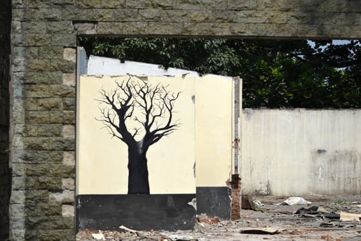Bandung, Indonesia - September 17, 2014: Wall graffiti that painted on house ruin.