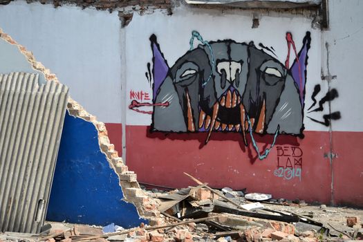 Bandung, Indonesia - September 17, 2014: Wall graffiti that painted on house ruin.