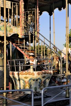 carousel with wooden horses decoration typical Camargue Saintes-Maries-de-la-Mer.