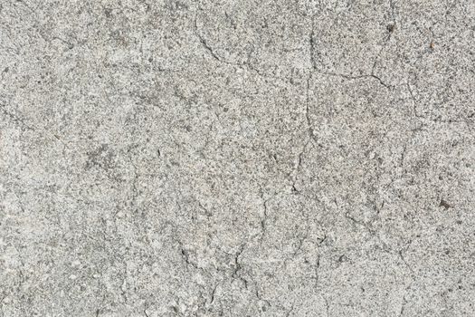 Cement wall background with rough surface texture.